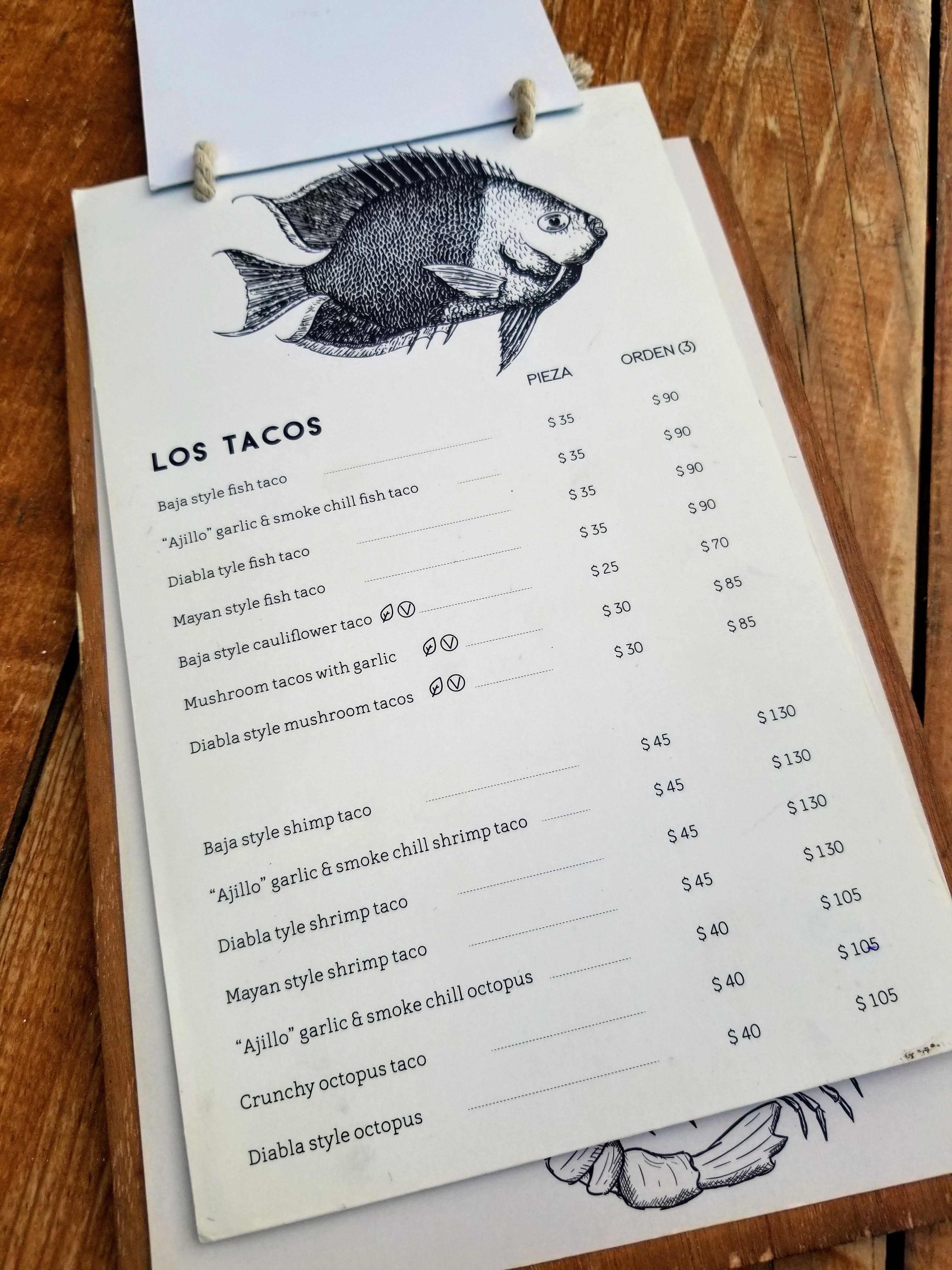 First page of Barba Negra's menu. A list of about a dozen different fish, shrimp, and other seafood tacos.