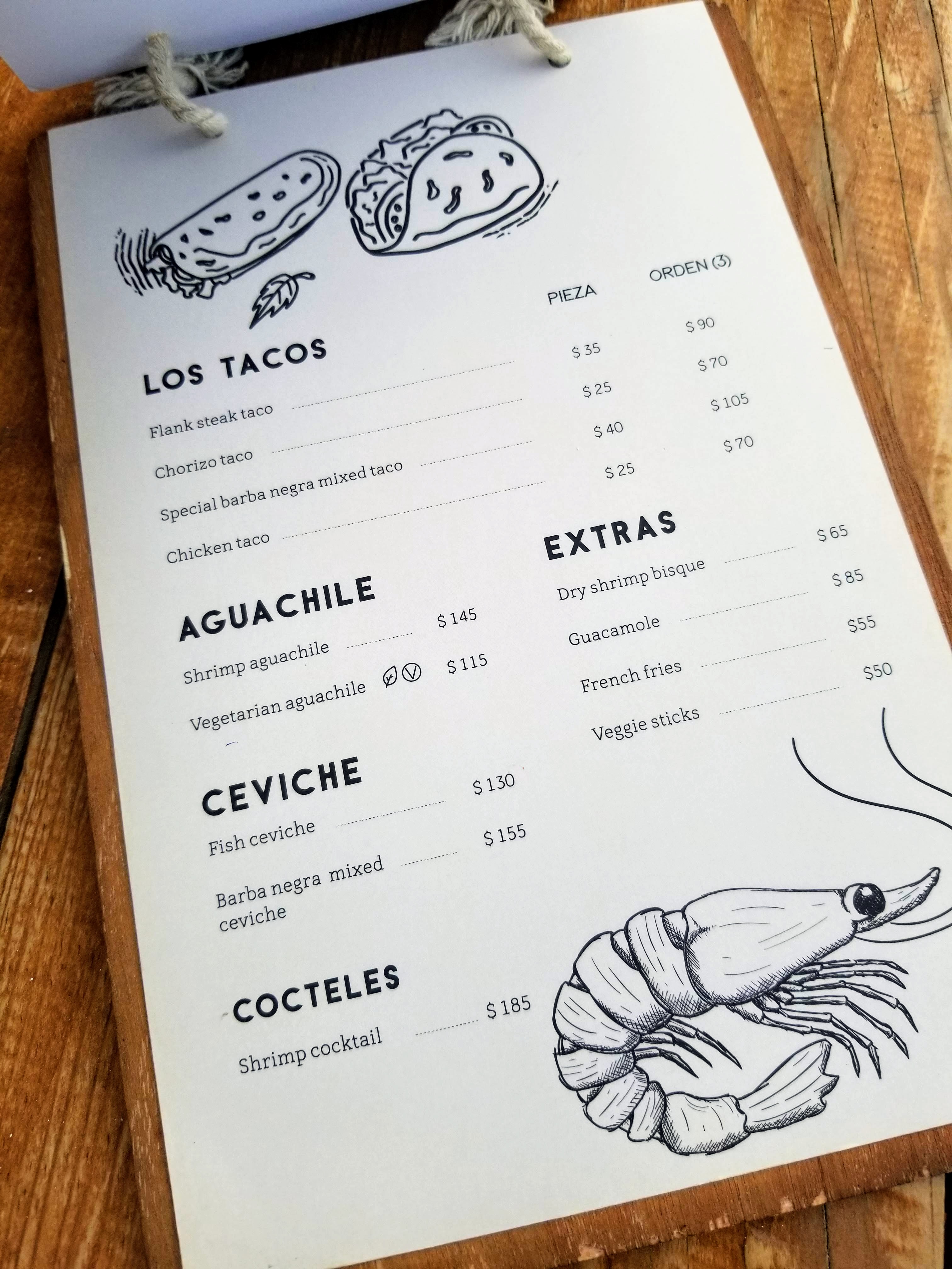 The second page of Barba Negra's menu with more tacos, ceviche, and guacamole.